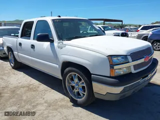 2004 Chevrolet Silverado 1500 Crew Cab LS with VIN 2GCEC13T141358677, listed as a IAAI auction lot 41873052 with 177,997 mi miles. Bid and sale history available at carsss.com. Image 1.