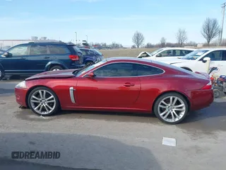 2008 Jaguar XK with VIN SAJWA43C089B22700, listed as a IAAI auction lot 41585734 with 67,946 mi miles. Bid and sale history available at carsss.com. Image 14.
