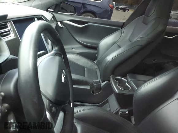 2016 Tesla Model S 90D with VIN 5YJSA1E42GF123351, listed as a Copart auction lot 63867265 with Not provided miles and Salvage title. Bid and sale history available at DreamBid. Image 9.