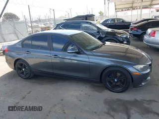 2015 BMW 3 Series 328i with VIN WBA3C1C56FK120073, listed as a IAAI auction lot 42571784 with 162,400 mi miles and . Bid and sale history available at DreamBid. Image 13.