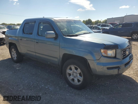 2006 Honda Ridgeline RTL with VIN 2HJYK16556H545357, listed as a Copart auction lot 70656694 with 153,668 mi miles and Salvage Title. Bid and sale history available at carsss.com. Image 4.