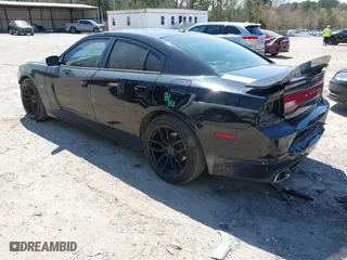 2013 Dodge Charger RT Plus with VIN 2C3CDXCT0DH616853, listed as a IAAI auction lot 41897577 with 171,503 mi miles. Bid and sale history available at carsss.com. Image 3.