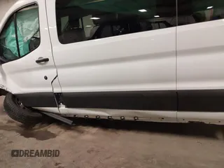 2019 Ford Transit Passenger XL with VIN 1FBZX2YM7KKA22871, listed as a IAAI auction lot 41721561 with 112,189 mi miles. Bid and sale history available at carsss.com. Image 21.