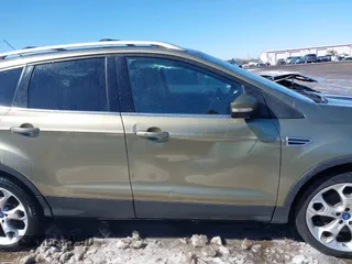 2013 Ford Escape Titanium with VIN 1FMCU9J99DUD46870, listed as a IAAI auction lot 41614409 with 141,739 mi miles and . Bid and sale history available at DreamBid. Image 13.