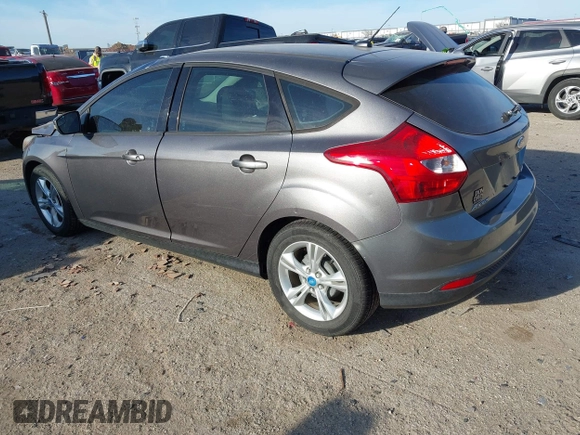 2013 Ford Focus SE with VIN 1FADP3K29DL220311, listed as a IAAI auction lot 41790487 with 136,257 mi miles. Bid and sale history available at carsss.com. Image 3.