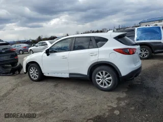 2015 Mazda CX-5 Sport with VIN JM3KE4BY9F0482410, listed as a Copart auction lot 50517175 with 195,709 mi miles and Salvage Title. Bid and sale history available at carsss.com. Image 2.