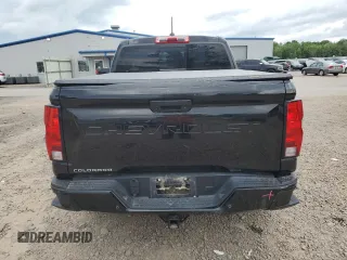 2023 Chevrolet Colorado 4WD Trail Boss с VIN 1GCPTEEKXP1241937, выставлен на аукционе Copart как лот 64436275 с пробегом 53 323 миль миль и Списание • Salvage title. История ставок и продаж доступна на DreamBid. Изображение 6.