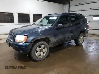 2001 Jeep Grand Cherokee Limited with VIN 1J4GW58N01C664996, listed as a Copart auction lot 58339825 with 288,153 mi miles and Salvage title. Bid and sale history available at DreamBid. Image 1.