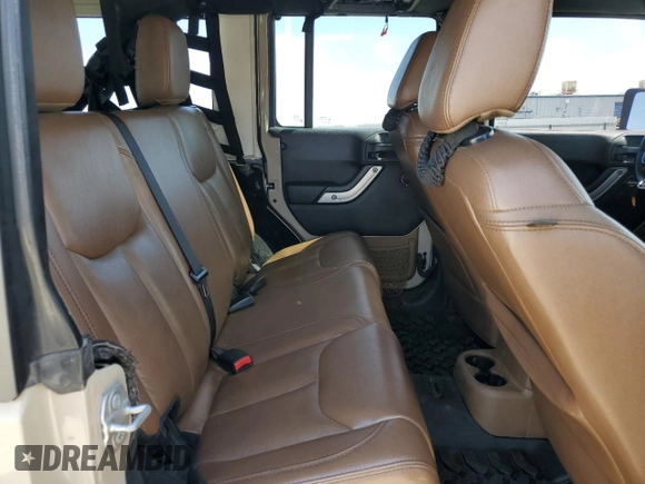 2016 Jeep Wrangler Unlimited Rubicon z VIN 1C4HJWFGXGL236560, wystawiony jako Copart lot #57528355 z przebiegiem 64 634 mil mil oraz Szkoda całkowita • Salvage title. Historia ofert i sprzedaży dostępna na DreamBid. Obrazek 11.