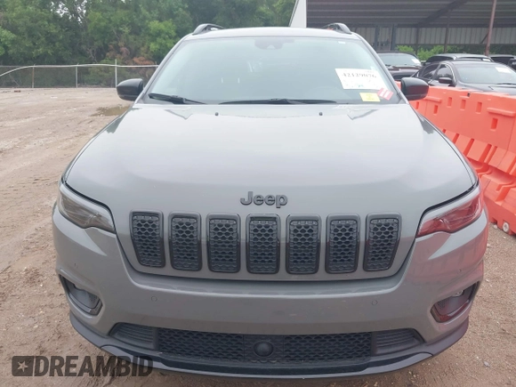 2023 Jeep Cherokee Altitude Lux with VIN 1C4PJMMB5PD114674, listed as a IAAI auction lot 42129076 with 54,269 mi miles. Bid and sale history available at carsss.com. Image 6.