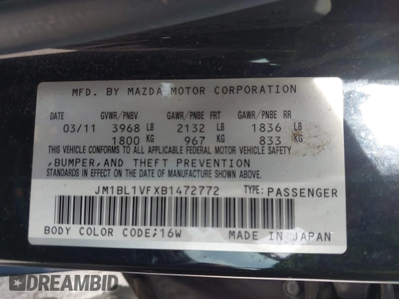 2011 Mazda Mazda3 i Touring with VIN JM1BL1VFXB1472772, listed as a IAAI auction lot 42180030 with 128,438 mi miles. Bid and sale history available at carsss.com. Image 9.
