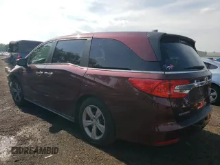 2018 Honda Odyssey EX with VIN 5FNRL6H55JB037386, listed as a Copart auction lot 63577475 with 125,498 mi miles and Salvage title. Bid and sale history available at DreamBid. Image 2.