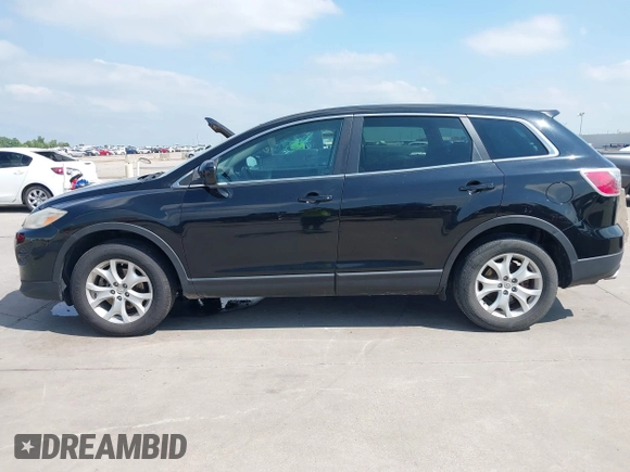 2011 Mazda CX-9 Sport with VIN JM3TB2BA7B0303120, listed as a IAAI auction lot 42427053 with 219,673 mi miles and . Bid and sale history available at DreamBid. Image 14.