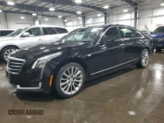 2018 Cadillac CT6 Luxury AWD z VIN 1G6KD5RSXJU102871, wystawiony jako Copart lot #54579165 z przebiegiem 31 219 mil mil oraz Szkody całkowita. Historia ofert i sprzedaży dostępna na DreamBid. Obrazek 1.