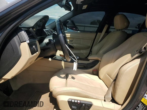 2014 BMW 3 Series 320i xDrive with VIN WBA3C3C53EK200375, listed as a Copart auction lot 59915595 with 104,320 mi miles and Salvage title. Bid and sale history available at DreamBid. Image 7.