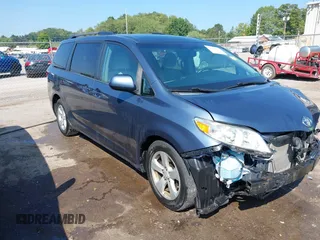 2015 Toyota Sienna LE AAS with VIN 5TDKK3DC0FS667195, listed as a IAAI auction lot 40204612 with 101,620 mi miles and . Bid and sale history available at DreamBid. Image 1.