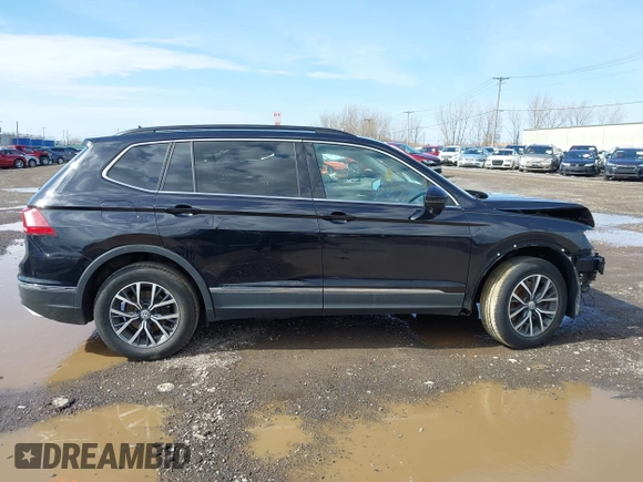 2020 Volkswagen Tiguan SE with VIN 3VV2B7AX5LM091857, listed as a IAAI auction lot 41922727 with 83,464 mi miles and . Bid and sale history available at DreamBid. Image 13.