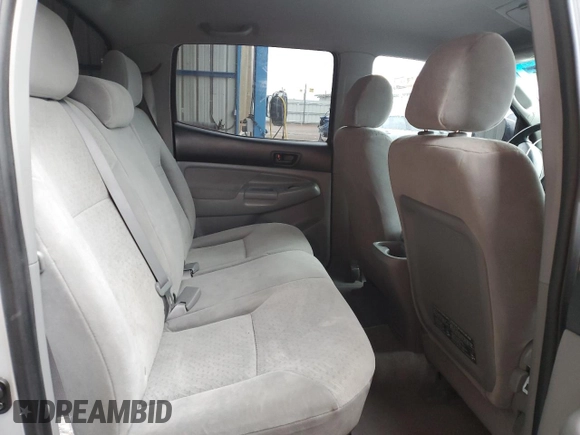 2007 Toyota Tacoma z VIN 5TEMU52NX7Z338432, wystawiony jako Copart lot #55851235 z przebiegiem 194 976 mil mil oraz Szkoda całkowita • Salvage title. Historia ofert i sprzedaży dostępna na DreamBid. Obrazek 10.