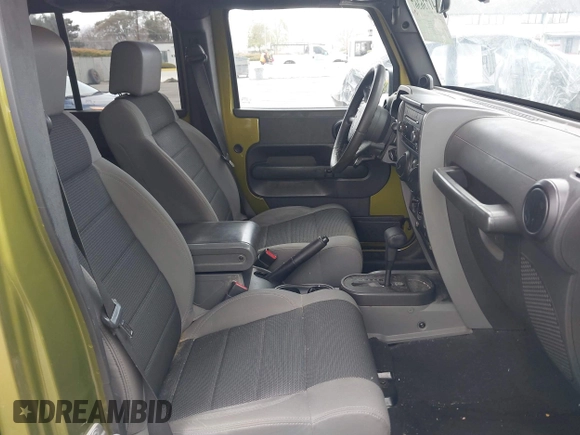 2007 Jeep Wrangler Unlimited X with VIN 1J8GB39107L114510, listed as a IAAI auction lot 41736367 with 467,567 mi miles and . Bid and sale history available at DreamBid. Image 5.