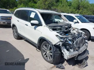 2016 Honda Pilot Touring with VIN 5FNYF6H97GB088824, listed as a IAAI auction lot 41991803 with 84,761 mi miles. Bid and sale history available at carsss.com. Image 1.