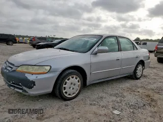 2002 Honda Accord LX z VIN 1HGCG56482A116917, wystawiony jako Copart lot #56599905 z przebiegiem 241 665 mil mil oraz Szkoda całkowita • Salvage title. Historia ofert i sprzedaży dostępna na DreamBid. Obrazek 1.