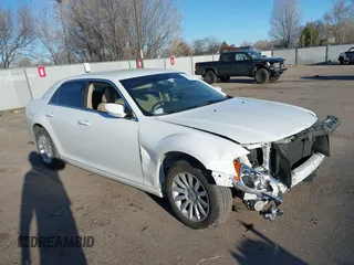 2012 Chrysler 300 with VIN 2C3CCAAG6CH253107, listed as a IAAI auction lot 41754417 with 101,578 mi miles. Bid and sale history available at carsss.com. Image 1.
