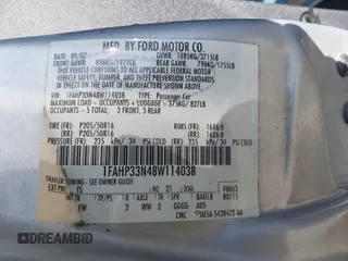 2008 Ford Focus SE with VIN 1FAHP33N48W114038, listed as a IAAI auction lot 41533744 with 143,065 mi miles. Bid and sale history available at carsss.com. Image 9.