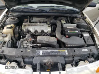 2001 Saturn SL z VIN 1G8ZH52851Z286886, wystawiony jako Copart lot #84883824 z przebiegiem Nie podano mil oraz Szkoda całkowita • Salvage title. Historia ofert i sprzedaży dostępna na DreamBid. Obrazek 11.