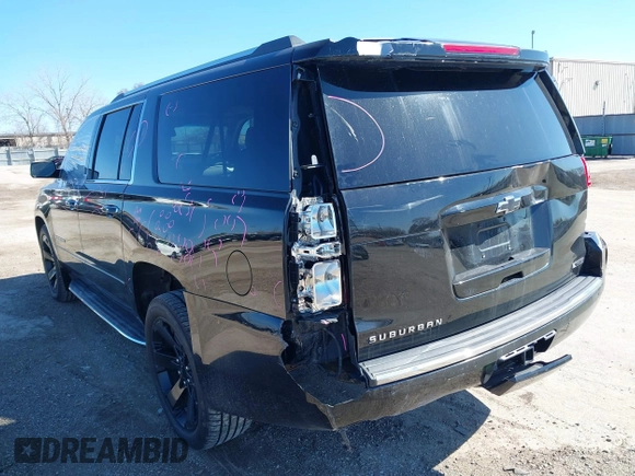 2017 Chevrolet Suburban Premier with VIN 1GNSKJKC8HR285321, listed as a IAAI auction lot 41796659 with 128,113 mi miles and . Bid and sale history available at DreamBid. Image 6.