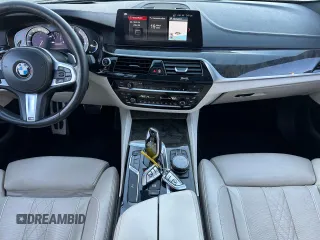 2018 BMW 5 Series M550i xDrive with VIN WBAJB9C55JB035226, listed as a Copart auction lot 57062675 with 156,183 mi miles and Clean title. Bid and sale history available at DreamBid. Image 9.