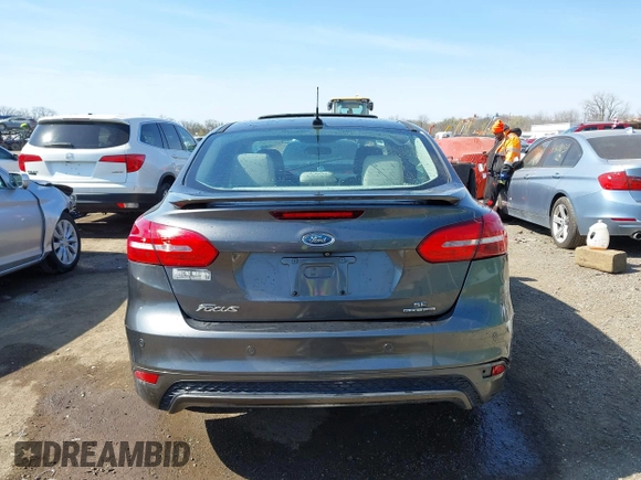 2015 Ford Focus SE with VIN 1FADP3F29FL268677, listed as a IAAI auction lot 42037244 with 118,018 mi miles. Bid and sale history available at carsss.com. Image 17.