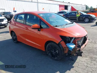 2019 Honda Fit Sport z VIN 3HGGK5H64KM717632, wystawiony jako IAAI lot #42164161 z przebiegiem 9 873 mil mil oraz . Historia ofert i sprzedaży dostępna na DreamBid. Obrazek 1.