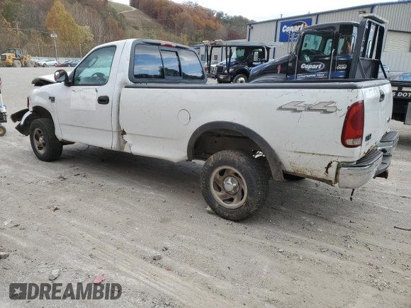 2002 Ford F-150 XL z VIN 1FTRF18W92NB71226, wystawiony jako Copart lot #76082214 z przebiegiem Nie podano mil oraz Szkoda całkowita • Salvage title. Historia ofert i sprzedaży dostępna na DreamBid. Obrazek 2.