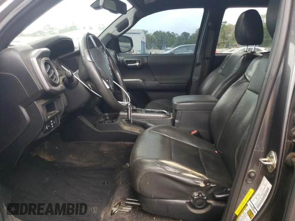2018 Toyota Tacoma SR with VIN 5TFCZ5AN1JX147799, listed as a Copart auction lot 54337455 with 189,899 mi miles and Salvage Title. Bid and sale history available at DreamBid. Image 7.
