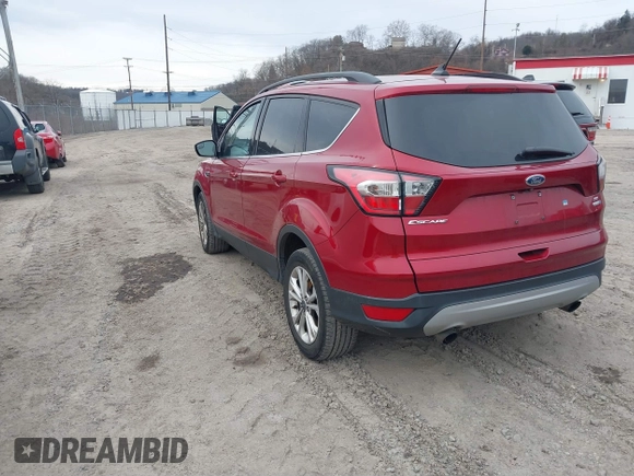 2018 Ford Escape SE z VIN 1FMCU9GD6JUA18684, wystawiony jako IAAI lot #41499540 z przebiegiem 105 127 mil mil oraz . Historia ofert i sprzedaży dostępna na DreamBid. Obrazek 3.