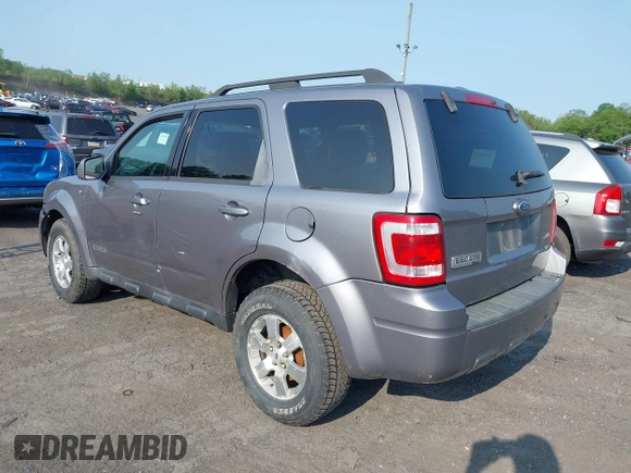 2008 Ford Escape Limited with VIN 1FMCU94138KE03023, listed as a IAAI auction lot 42393358 with 175,890 mi miles and . Bid and sale history available at DreamBid. Image 3.