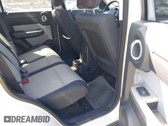 2007 Dodge Nitro SLT z VIN 1D8GU58K07W586777, wystawiony jako IAAI lot #42043802 z przebiegiem 143 324 mil mil oraz . Historia ofert i sprzedaży dostępna na DreamBid. Obrazek 8.