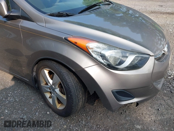 2013 Hyundai Elantra Limited z VIN 5NPDH4AE5DH245137, wystawiony jako IAAI lot #42372752 z przebiegiem 80 356 mil mil oraz . Historia ofert i sprzedaży dostępna na DreamBid. Obrazek 6.