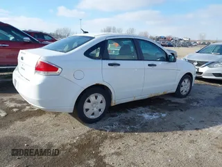 2008 Ford Focus S with VIN 1FAHP34N98W264337, listed as a IAAI auction lot 41414660 with 151,938 mi miles. Bid and sale history available at carsss.com. Image 4.
