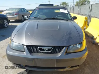 2003 Ford Mustang Deluxe z VIN 1FAFP44473F341011, wystawiony jako IAAI lot #42715064 z przebiegiem 177 458 mil mil oraz . Historia ofert i sprzedaży dostępna na DreamBid. Obrazek 6.