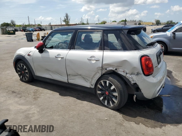 2017 MINI Hardtop 4 Door Cooper S with VIN WMWXU3C55H2D33015, listed as a Copart auction lot 63756435 with 63,596 mi miles and Salvage title. Bid and sale history available at DreamBid. Image 2.