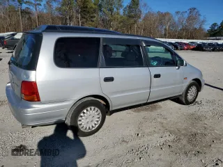 1997 Honda Odyssey with VIN RA11239041, listed as a Copart auction lot 85819024 with 79,952 mi miles and Salvage title. Bid and sale history available at DreamBid. Image 3.