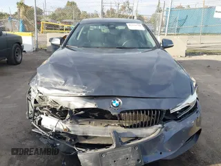2014 BMW 4 Series 428i with VIN WBA3N7C5XEF719384, listed as a IAAI auction lot 41694678 with 115,517 mi miles and . Bid and sale history available at carsss.com. Image 12.