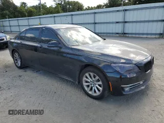 2015 BMW 7 Series 740Li with VIN WBAYE4C58FD138919, listed as a Copart auction lot 69409074 with 145,549 mi miles and Salvage Title. Bid and sale history available at DreamBid. Image 4.