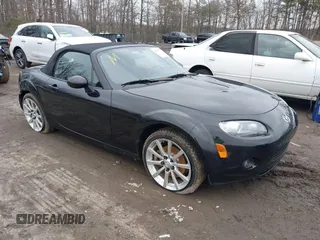 2006 Mazda MX-5 Miata Grand Touring with VIN JM1NC25F360118266, listed as a IAAI auction lot 38470775 with 184,019 mi miles and . Bid and sale history available at DreamBid. Image 1.