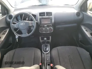 2014 Scion xD with VIN JTKKUPB49E1040402, listed as a Copart auction lot 64997275 with 242,266 mi miles and Clean title. Bid and sale history available at DreamBid. Image 8.