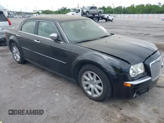2007 Chrysler 300 C with VIN 2C3LA63H97H861511, listed as a IAAI auction lot 42136495 with 113,972 mi miles. Bid and sale history available at carsss.com. Image 1.