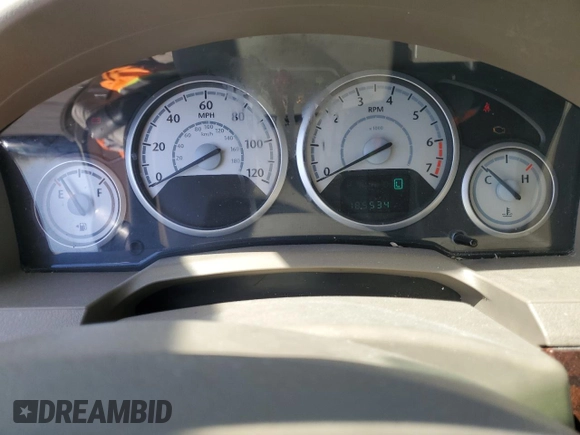 2010 Chrysler Town & Country LX with VIN 2A4RR4DE0AR188949, listed as a Copart auction lot 54140515 with 185,534 mi miles and Salvage Title. Bid and sale history available at DreamBid. Image 9.