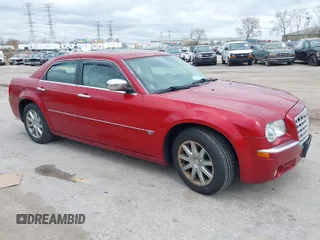 2007 Chrysler 300 C with VIN 2C3KA63H57H684368, listed as a IAAI auction lot 42046039 with 117,478 mi miles. Bid and sale history available at carsss.com. Image 1.