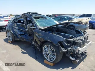 2020 Genesis G70 2.0T with VIN KMTG34LA0LU055791, listed as a IAAI auction lot 42612619 with 74,582 mi miles and . Bid and sale history available at DreamBid. Image 1.